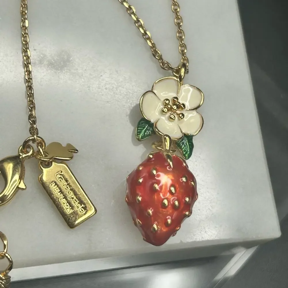 Kate Spade Flower and Strawberry pendant necklace #658 gold tone chain 16-18” - Picture 2 of 5